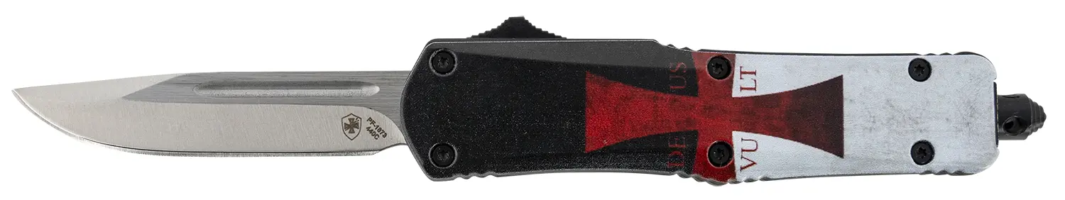 Knife with black and red handle and silver blade.