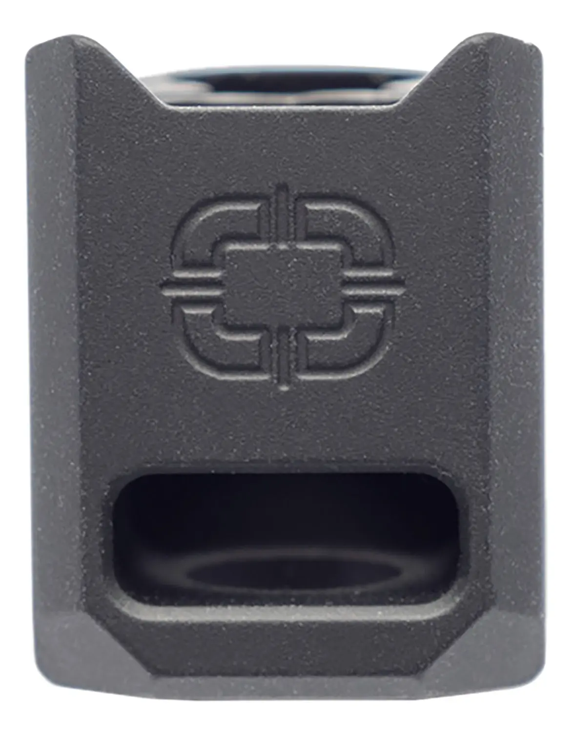 Close-up of a black firearm accessory with a cross symbol and a slot opening.