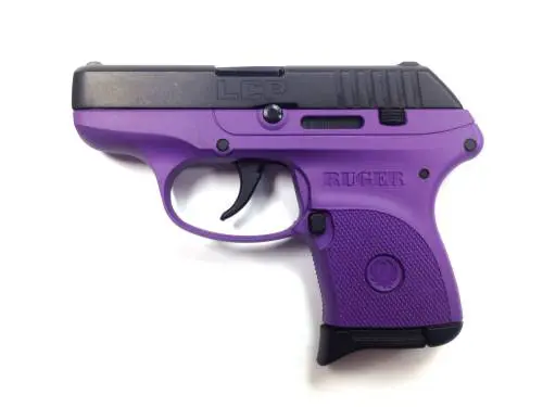 Compact purple and black Ruger LCP pistol for concealed carry.