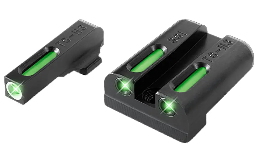 Compact laser sight attachments for firearms with green laser pointers.