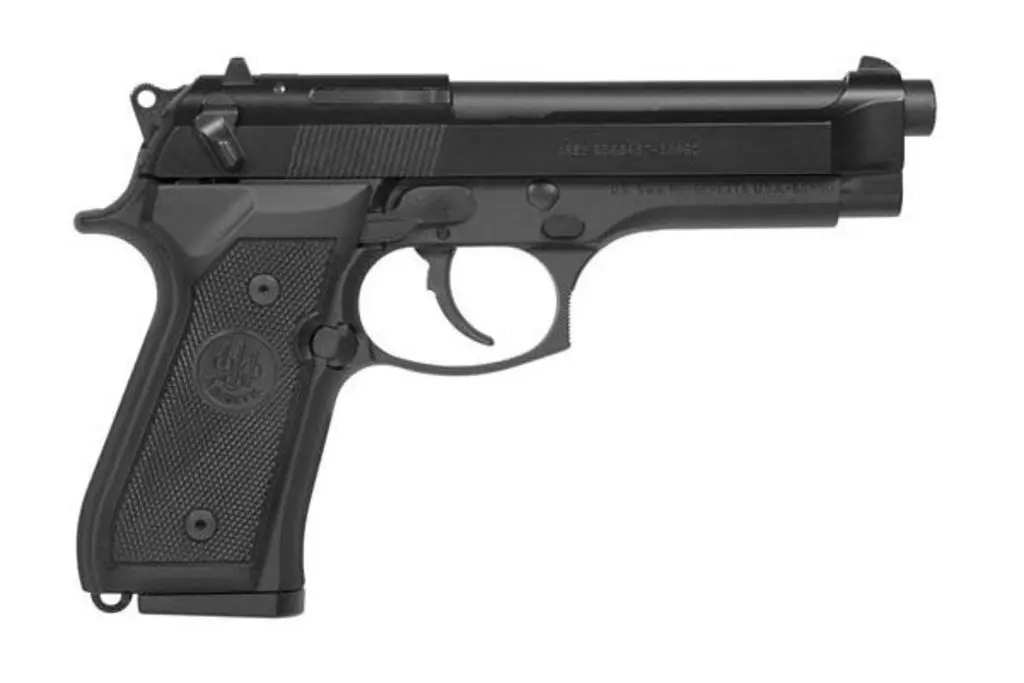 A semi-automatic pistol with a black finish and textured grip, suitable for self-defense and shootin.
