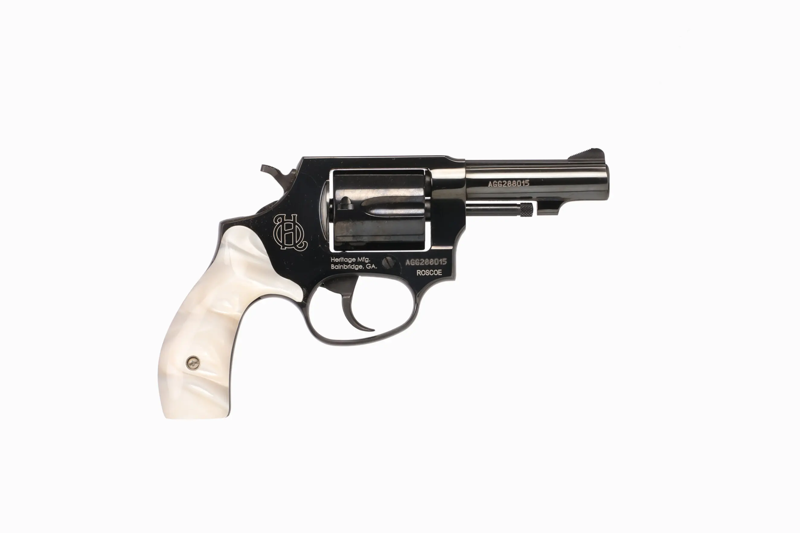 Classic black revolver with ivory grip, ready for shooting or display.