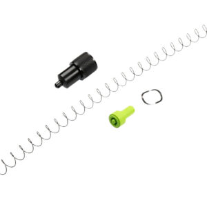 Spring-loaded gun cleaning coil with green tip and metal ring for firearm maintenance.
