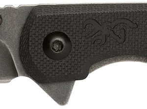 Black folding knife with textured handle and sharp blade.