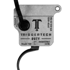 Close-up of TriggerTech Duty firearm trigger with safety lever and curved trigger.